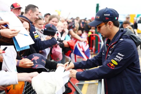 Sergio Perez (MEX) Red Bull Racing with fans.
09.07.2023. Formula 1 World Championship, Rd 11, British Grand Prix, Silverstone, England, Race Day.
- www.xpbimages.com, EMail: requests@xpbimages.com © Copyright: Coates / XPB Images