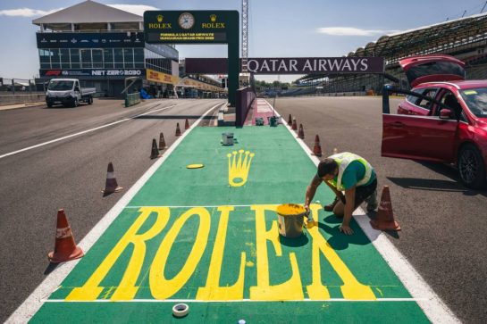 Circuit atmosphere - Rolex branding painted on the circuit.
20.07.2023. Formula 1 World Championship, Rd 12, Hungarian Grand Prix, Budapest, Hungary, Preparation Day.
- www.xpbimages.com, EMail: requests@xpbimages.com © Copyright: Bearne / XPB Images