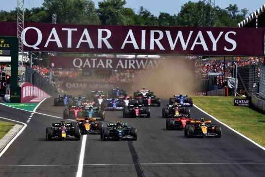 Max Verstappen (NLD) Red Bull Racing RB19 and Lewis Hamilton (GBR) Mercedes AMG F1 W14 at the start of the race.
23.07.2023. Formula 1 World Championship, Rd 12, Hungarian Grand Prix, Budapest, Hungary, Race Day.
- www.xpbimages.com, EMail: requests@xpbimages.com © Copyright: Charniaux / XPB Images