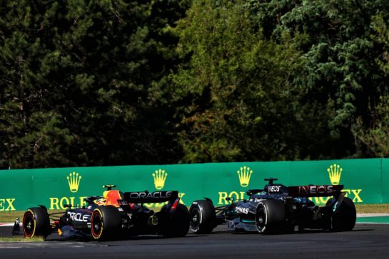 George Russell (GBR) Mercedes AMG F1 W14 and Sergio Perez (MEX) Red Bull Racing RB19 battle for position.
23.07.2023. Formula 1 World Championship, Rd 12, Hungarian Grand Prix, Budapest, Hungary, Race Day.
- www.xpbimages.com, EMail: requests@xpbimages.com © Copyright: Coates / XPB Images
