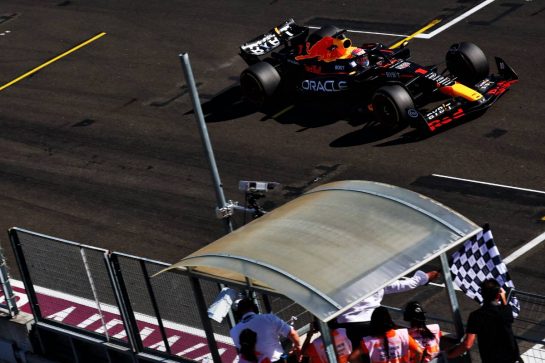 Race winner Max Verstappen (NLD) Red Bull Racing RB19 takes the chequered flag at the end of the race.
23.07.2023. Formula 1 World Championship, Rd 12, Hungarian Grand Prix, Budapest, Hungary, Race Day.
- www.xpbimages.com, EMail: requests@xpbimages.com © Copyright: Coates / XPB Images