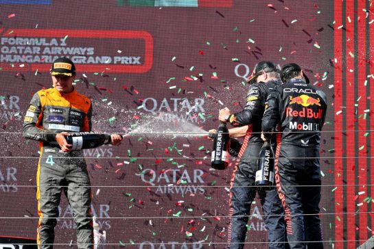 The podium (L to R): Lando Norris (GBR) McLaren, second; Max Verstappen (NLD) Red Bull Racing, race winner; Sergio Perez (MEX) Red Bull Racing, third.
23.07.2023. Formula 1 World Championship, Rd 12, Hungarian Grand Prix, Budapest, Hungary, Race Day.
- www.xpbimages.com, EMail: requests@xpbimages.com © Copyright: Moy / XPB Images