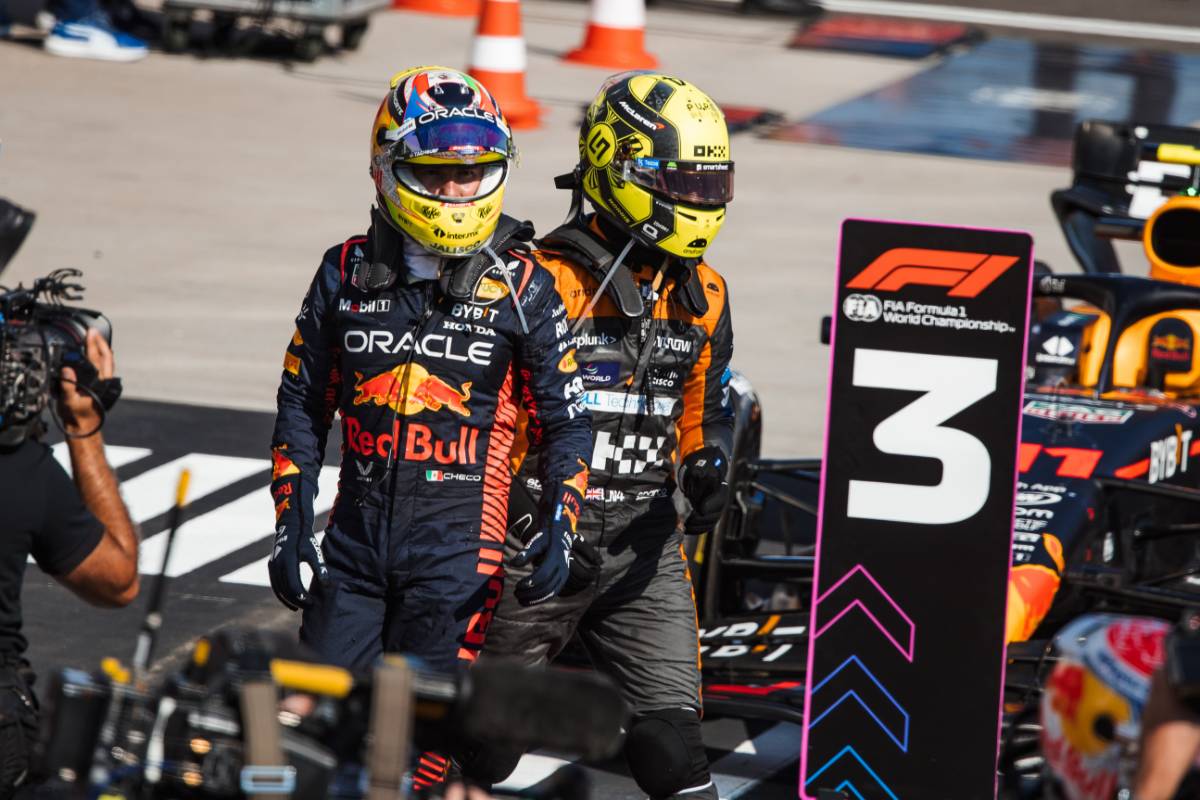 (L to R): third placed Sergio Perez (MEX) Red Bull Racing in parc ferme with second placed Lando Norris (GBR) McLaren. 23.07.2023. Formula 1 World Championship, Rd 12, Hungarian Grand Prix, Budapest, Hungary, Race Day. - www.xpbimages.com, EMail: requests@xpbimages.com © Copyright: Bearne / XPB Images