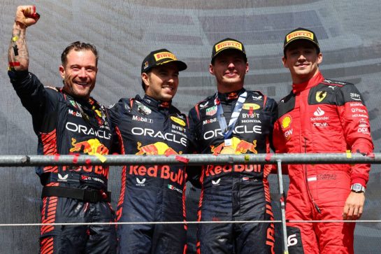 The podium (L to R): Greg Reeson (GBR) Red Bull Racing Tyre Technician; Sergio Perez (MEX) Red Bull Racing, second; Max Verstappen (NLD) Red Bull Racing, race winner; Charles Leclerc (MON) Ferrari, third. 30.07.2023. Formula 1 World Championship, Rd 13, Belgian Grand Prix, Spa Francorchamps, Belgium, Race Day. - www.xpbimages.com, EMail: requests@xpbimages.com © Copyright: Batchelor / XPB Images