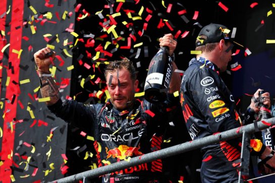 Greg Reeson (GBR) Red Bull Racing Tyre Technician celebrates on the podium.
30.07.2023. Formula 1 World Championship, Rd 13, Belgian Grand Prix, Spa Francorchamps, Belgium, Race Day.
- www.xpbimages.com, EMail: requests@xpbimages.com © Copyright: Moy / XPB Images