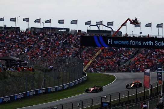 Carlos Sainz Jr (ESP) Ferrari SF-23 and Lando Norris (GBR) McLaren MCL60.
25.08.2023. Formula 1 World Championship, Rd 14, Dutch Grand Prix, Zandvoort, Netherlands, Practice Day.
- www.xpbimages.com, EMail: requests@xpbimages.com © Copyright: Coates / XPB Images
