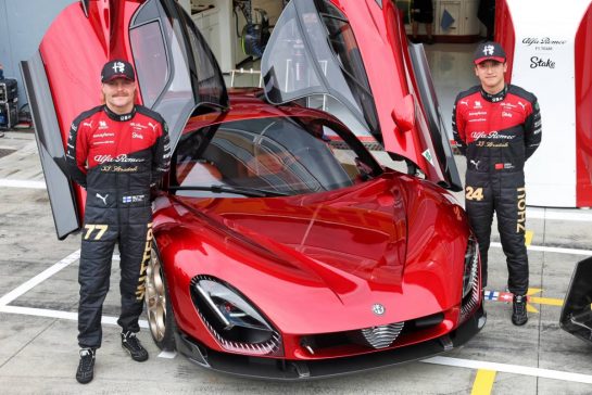 (L to R): Valtteri Bottas (FIN) Alfa Romeo F1 Team and Zhou Guanyu (CHN) Alfa Romeo F1 Team with the Alfa Romeo 33 Stradale.
31.08.2023. Formula 1 World Championship, Rd 15, Italian Grand Prix, Monza, Italy, Preparation Day.
- www.xpbimages.com, EMail: requests@xpbimages.com © Copyright: Bearne / XPB Images