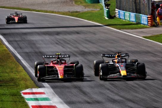 Max Verstappen (NLD) Red Bull Racing RB19 passes Carlos Sainz Jr (ESP) Ferrari SF-23 to lead the race.
03.09.2023. Formula 1 World Championship, Rd 15, Italian Grand Prix, Monza, Italy, Race Day.
 - www.xpbimages.com, EMail: requests@xpbimages.com © Copyright: Coates / XPB Images