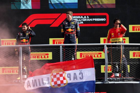 The podium (L to R): Sergio Perez (MEX) Red Bull Racing, second; Max Verstappen (NLD) Red Bull Racing, race winner; Carlos Sainz Jr (ESP) Ferrari, third.
03.09.2023. Formula 1 World Championship, Rd 15, Italian Grand Prix, Monza, Italy, Race Day.
 - www.xpbimages.com, EMail: requests@xpbimages.com © Copyright: Staley / XPB Images