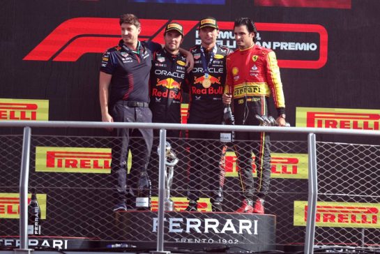 The podium (L to R): Jamie Ptaszynski, Red Bull Racing Legal Counsel; Sergio Perez (MEX) Red Bull Racing, second; Max Verstappen (NLD) Red Bull Racing, race winner; Carlos Sainz Jr (ESP) Ferrari, third.
03.09.2023. Formula 1 World Championship, Rd 15, Italian Grand Prix, Monza, Italy, Race Day.
 - www.xpbimages.com, EMail: requests@xpbimages.com © Copyright: Staley / XPB Images