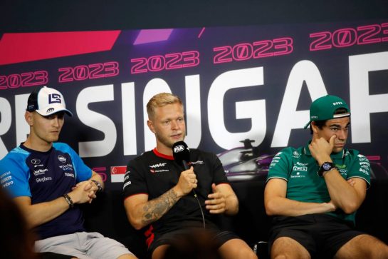 (L to R): Logan Sargeant (USA) Williams Racing; Kevin Magnussen (DEN) Haas F1 Team; and Lance Stroll (CDN) Aston Martin F1 Team, in the FIA Press Conference.
14.09.2023. Formula 1 World Championship, Rd 16, Singapore Grand Prix, Marina Bay Street Circuit, Singapore, Preparation Day.
- www.xpbimages.com, EMail: requests@xpbimages.com © Copyright: XPB Images