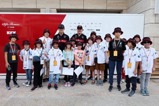 Zhou Guanyu (CHN) Alfa Romeo F1 Team and Valtteri Bottas (FIN) Alfa Romeo F1 Team with young guests.
05.10.2023. Formula 1 World Championship, Rd 18, Qatar Grand Prix, Doha, Qatar, Preparation Day.
- www.xpbimages.com, EMail: requests@xpbimages.com © Copyright: Moy / XPB Images