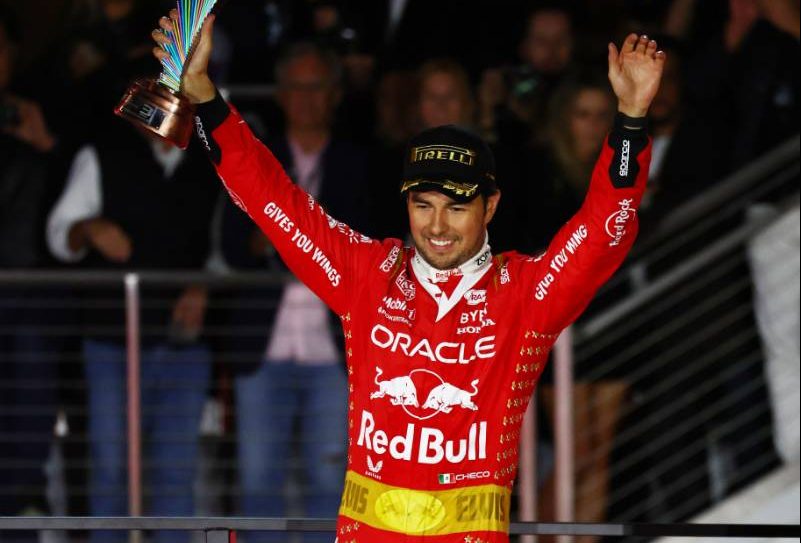 Sergio Perez (MEX) Red Bull Racing celebrates his third position on the podium. 18.11.2023. Formula 1 World Championship, Rd 22, Las Vegas Grand Prix, Las Vegas, Nevada, USA, Race Day. - www.xpbimages.com, EMail: requests@xpbimages.com © Copyright: Coates / XPB Images