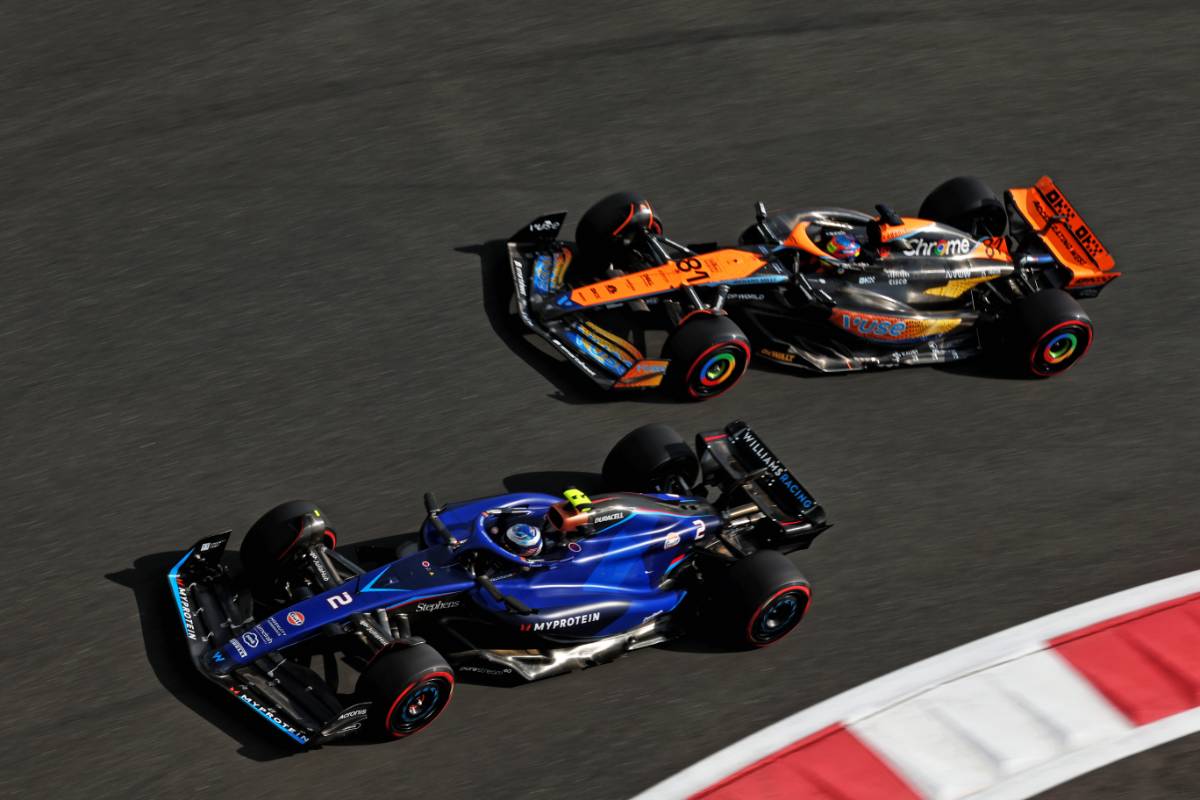 Logan Sargeant (USA) Williams Racing FW45 and Oscar Piastri (AUS) McLaren MCL60. 24.11.2023. Formula 1 World Championship, Rd 23, Abu Dhabi Grand Prix, Yas Marina Circuit, Abu Dhabi, Practice Day. - www.xpbimages.com, EMail: requests@xpbimages.com © Copyright: Moy / XPB Images