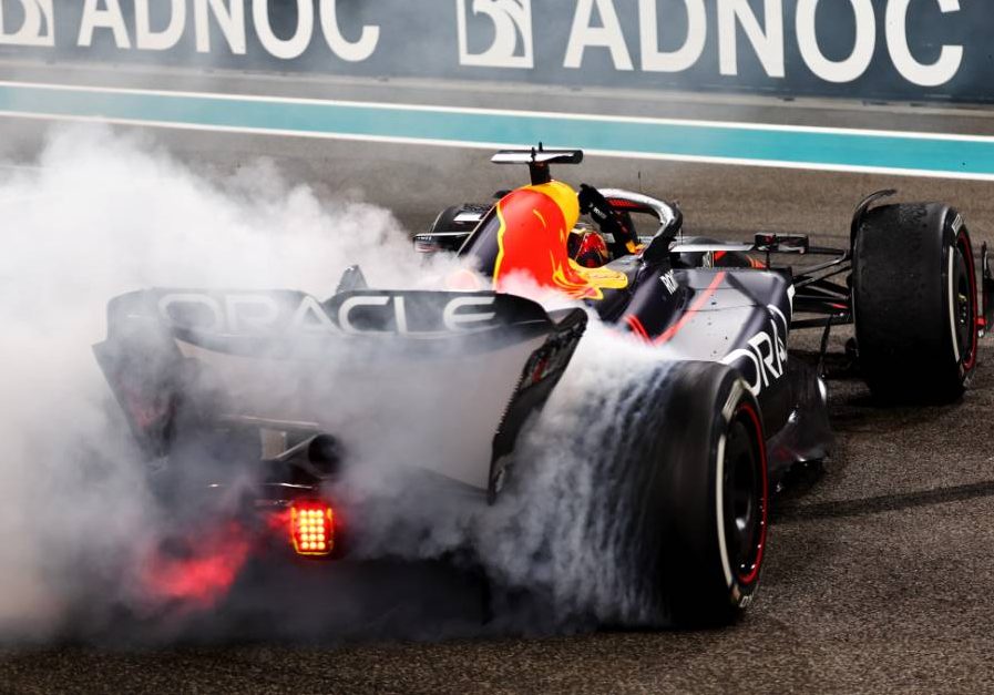 Race winner Max Verstappen (NLD) Red Bull Racing RB19 celebrates with doughnuts at the end of the race in parc ferme. 26.11.2023. Formula 1 World Championship, Rd 23, Abu Dhabi Grand Prix, Yas Marina Circuit, Abu Dhabi, Race Day. - www.xpbimages.com, EMail: requests@xpbimages.com © Copyright: Batchelor / XPB Images