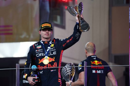Race winner Max Verstappen (NLD) Red Bull Racing celebrates on the podium.
26.11.2023. Formula 1 World Championship, Rd 23, Abu Dhabi Grand Prix, Yas Marina Circuit, Abu Dhabi, Race Day.
 - www.xpbimages.com, EMail: requests@xpbimages.com © Copyright: Coates / XPB Images