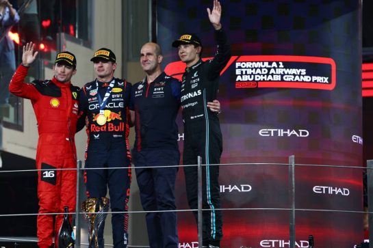 The podium (L to R): Charles Leclerc (MON) Ferrari, second; Max Verstappen (NLD) Red Bull Racing, race winner; Jamie Meades (GBR) Red Bull Racing Head Of Supply Chain Operations; George Russell (GBR) Mercedes AMG F1, third.
26.11.2023. Formula 1 World Championship, Rd 23, Abu Dhabi Grand Prix, Yas Marina Circuit, Abu Dhabi, Race Day.
 - www.xpbimages.com, EMail: requests@xpbimages.com © Copyright: Coates / XPB Images