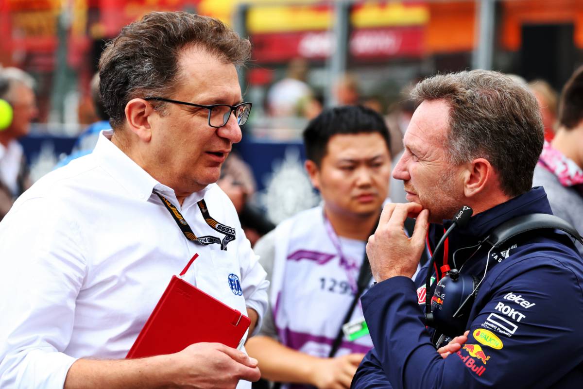 (L to R): Nicholas Tombazis (GRE) FIA Head of Single-Seater Technical Matters with Christian Horner (GBR) Red Bull Racing Team Principal on the grid. 30.07.2023. Formula 1 World Championship, Rd 13, Belgian Grand Prix, Spa Francorchamps, Belgium, Race Day. - www.xpbimages.com, EMail: requests@xpbimages.com © Copyright: Coates / XPB Images