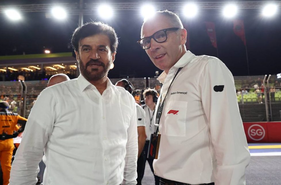 (L to R): Mohammed Bin Sulayem (UAE) FIA President with Stefano Domenicali (ITA) Formula One President and CEO on the grid. 17.09.2023. Formula 1 World Championship, Rd 16, Singapore Grand Prix, Marina Bay Street Circuit, Singapore, Race Day. - www.xpbimages.com, EMail: requests@xpbimages.com © Copyright: Moy / XPB Images