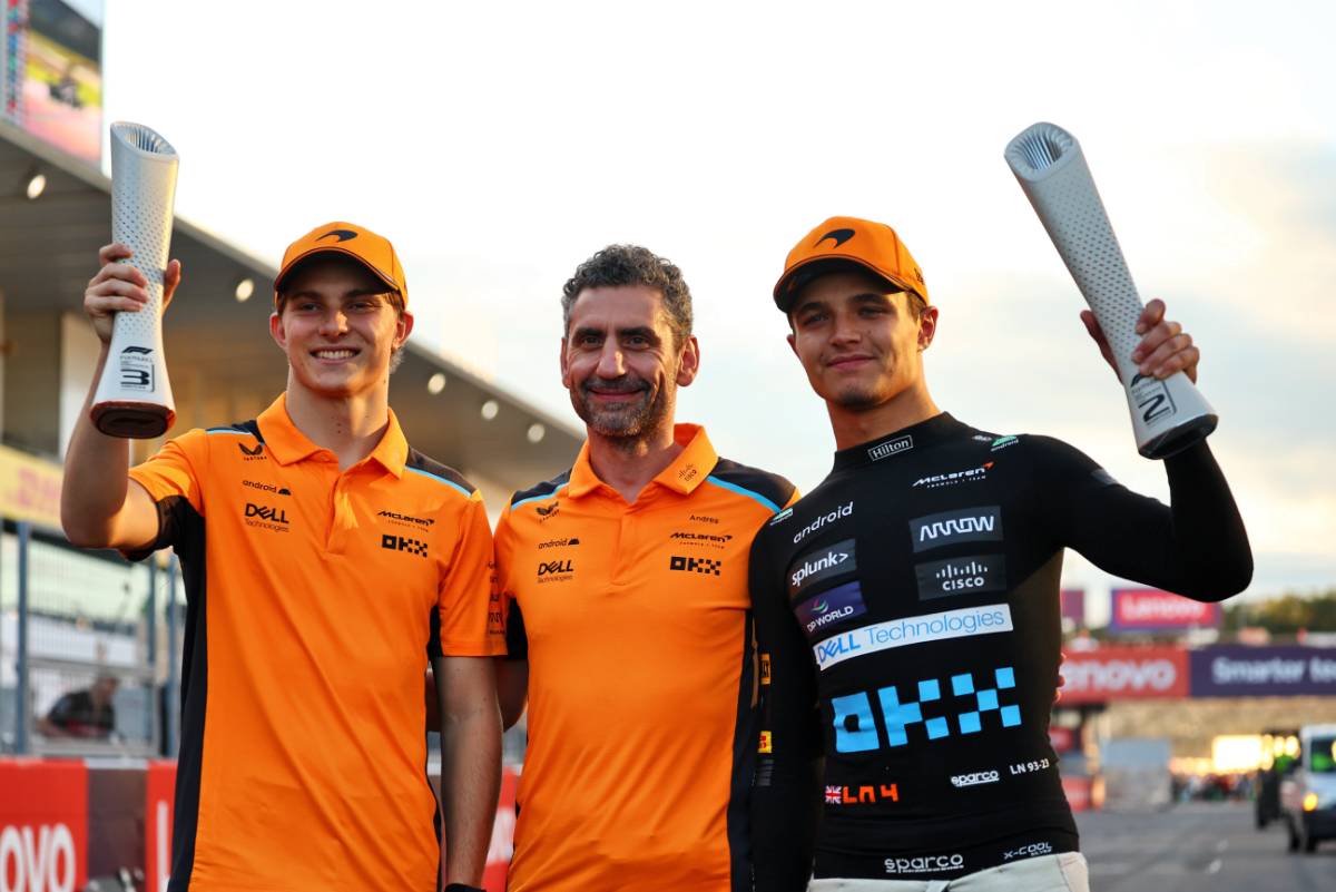 (L to R): Oscar Piastri (AUS) McLaren celebrates his third position with Andrea Stella (ITA) McLaren Team Principal and second placed team mate Lando Norris (GBR) McLaren. 24.09.2023. Formula 1 World Championship, Rd 17, Japanese Grand Prix, Suzuka, Japan, Race Day. - www.xpbimages.com, EMail: requests@xpbimages.com © Copyright: Batchelor / XPB Images