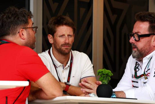 Romain Grosjean (FRA) IndyCar Driver (Centre) with Gwen Lagrue, Head of Mercedes AMG Driver Development (Right).
02.03.2024. Formula 1 World Championship, Rd 1, Bahrain Grand Prix, Sakhir, Bahrain, Race Day.
 - www.xpbimages.com, EMail: requests@xpbimages.com © Copyright: Coates / XPB Images