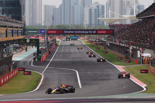 SHANGHAI, CHINA - APRIL 20: Max Verstappen of the Netherlands driving the (1) Oracle Red Bull Racing RB20 leads Carlos Sainz of Spain driving (55) the Ferrari SF-24 on track during the Sprint ahead of the F1 Grand Prix of China at Shanghai International Circuit on April 20, 2024 in Shanghai, China. (Photo by Lars Baron/Getty Images) // Getty Images / Red Bull Content Pool // SI202404200118 // Usage for editorial use only //