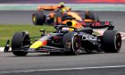SHANGHAI, CHINA - APRIL 21: Max Verstappen of the Netherlands driving the (1) Oracle Red Bull Racing RB20 leads Lando Norris of Great Britain driving the (4) McLaren MCL38 Mercedes on track during the F1 Grand Prix of China at Shanghai International Circuit on April 21, 2024 in Shanghai, China. (Photo by Lintao Zhang/Getty Images ) // Getty Images / Red Bull Content Pool // SI202404210236 // Usage for editorial use only //