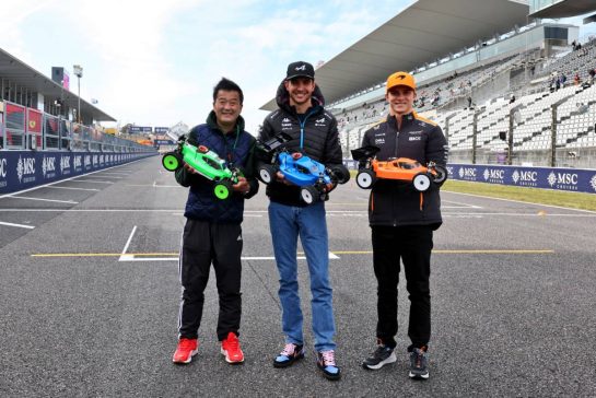 (L to R): Esteban Ocon (FRA) Alpine F1 Team and Oscar Piastri (AUS) McLaren - radio controlled cars.
04.04.2024. Formula 1 World Championship, Rd 4, Japanese Grand Prix, Suzuka, Japan, Preparation Day.
- www.xpbimages.com, EMail: requests@xpbimages.com © Copyright: Moy / XPB Images