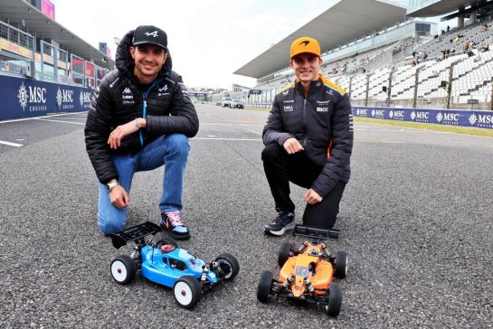 (L to R): Esteban Ocon (FRA) Alpine F1 Team and Oscar Piastri (AUS) McLaren - radio controlled cars.
04.04.2024. Formula 1 World Championship, Rd 4, Japanese Grand Prix, Suzuka, Japan, Preparation Day.
- www.xpbimages.com, EMail: requests@xpbimages.com © Copyright: Moy / XPB Images