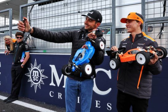 (L to R): Esteban Ocon (FRA) Alpine F1 Team and Oscar Piastri (AUS) McLaren - radio controlled cars.
04.04.2024. Formula 1 World Championship, Rd 4, Japanese Grand Prix, Suzuka, Japan, Preparation Day.
- www.xpbimages.com, EMail: requests@xpbimages.com © Copyright: Moy / XPB Images