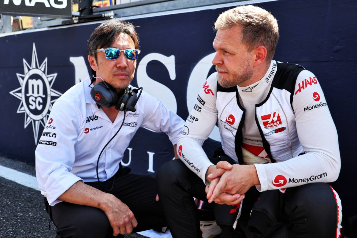 (L to R): Ayao Komatsu (JPN) Haas F1 Team Principal with Kevin Magnussen (DEN) Haas F1 Team on the grid. 07.04.2024. Formula 1 World Championship, Rd 4, Japanese Grand Prix, Suzuka, Japan, Race Day. - www.xpbimages.com, EMail: requests@xpbimages.com © Copyright: Moy / XPB Images