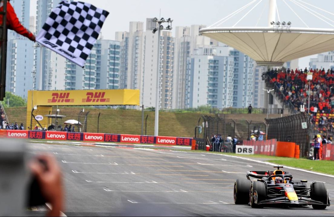 Race winner Max Verstappen (NLD) Red Bull Racing RB20 takes the chequered flag at the end of Sprint. 20.04.2024. Formula 1 World Championship, Rd 5, Chinese Grand Prix, Shanghai, China, Sprint and Qualifying Day. - www.xpbimages.com, EMail: requests@xpbimages.com © Copyright: Bearne / XPB Images
