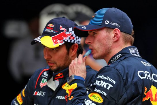 Sprint winner Max Verstappen (NLD) Red Bull Racing (Right) with team mate Sergio Perez (MEX) Red Bull Racing in parc ferme.
20.04.2024. Formula 1 World Championship, Rd 5, Chinese Grand Prix, Shanghai, China, Sprint and Qualifying Day.
 - www.xpbimages.com, EMail: requests@xpbimages.com © Copyright: Coates / XPB Images
