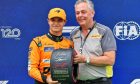 (L to R): Lando Norris (GBR) McLaren receives the Pirelli Pole Position Award from Mario Isola (ITA) Pirelli Racing Manager. 20.07.2024. Formula 1 World Championship, Rd 13, Hungarian Grand Prix, Budapest, Hungary, Qualifying Day. - www.xpbimages.com, EMail: requests@xpbimages.com © Copyright: Batchelor / XPB Images