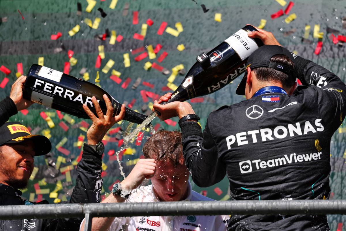 Race winner George Russell (GBR) Mercedes AMG F1 celebrates on the podium with Joey McMillan (GBR) Mercedes AMG F1 Lead Race Strategist and Lewis Hamilton (GBR) Mercedes AMG F1. 28.07.2024. Formula 1 World Championship, Rd 14, Belgian Grand Prix, Spa Francorchamps, Belgium, Race Day. - www.xpbimages.com, EMail: requests@xpbimages.com © Copyright: Charniaux / XPB Images