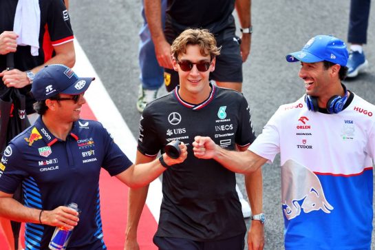 (L to R): Sergio Perez (MEX) Red Bull Racing with George Russell (GBR) Mercedes AMG F1 and Daniel Ricciardo (AUS) RB on the drivers' parade.
01.09.2024. Formula 1 World Championship, Rd 16, Italian Grand Prix, Monza, Italy, Race Day.
- www.xpbimages.com, EMail: requests@xpbimages.com © Copyright: Batchelor / XPB Images