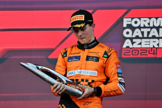 Race winner Oscar Piastri (AUS) McLaren celebrates on the podium.
15.09.2024. Formula 1 World Championship, Rd 17, Azerbaijan Grand Prix, Baku Street Circuit, Azerbaijan, Race Day.
- www.xpbimages.com, EMail: requests@xpbimages.com © Copyright: Batchelor / XPB Images