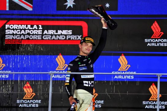 Race winner Lando Norris (GBR) McLaren celebrates on the podium.
22.09.2024. Formula 1 World Championship, Rd 18, Singapore Grand Prix, Marina Bay Street Circuit, Singapore, Race Day.
- www.xpbimages.com, EMail: requests@xpbimages.com © Copyright: Moy / XPB Images
