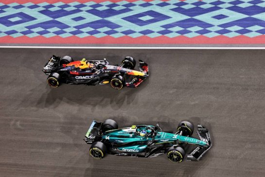 Fernando Alonso (ESP) Aston Martin F1 Team AMR24 and Sergio Perez (MEX) Red Bull Racing RB20.
01.12.2024. Formula 1 World Championship, Rd 23, Qatar Grand Prix, Doha, Qatar, Race Day.
- www.xpbimages.com, EMail: requests@xpbimages.com © Copyright: Bearne / XPB Images