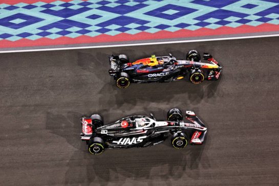 Sergio Perez (MEX) Red Bull Racing RB20 and Kevin Magnussen (DEN) Haas VF-24.
01.12.2024. Formula 1 World Championship, Rd 23, Qatar Grand Prix, Doha, Qatar, Race Day.
- www.xpbimages.com, EMail: requests@xpbimages.com © Copyright: Bearne / XPB Images