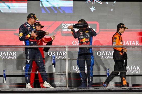 Race winner Max Verstappen (NLD) Red Bull Racing celebrates on the podium.
01.12.2024. Formula 1 World Championship, Rd 23, Qatar Grand Prix, Doha, Qatar, Race Day.
- www.xpbimages.com, EMail: requests@xpbimages.com © Copyright: Charniaux / XPB Images
