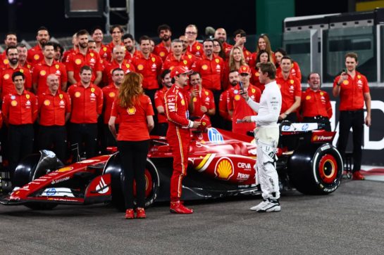 Charles Leclerc (FRA), Scuderia Ferrari Bard Pitt (USA), American actor 
05.12.2024. Formula 1 World Championship, Rd 24, Abu Dhabi Grand Prix, Yas Marina Circuit, Abu Dhabi, Preparation Day.
- www.xpbimages.com, EMail: requests@xpbimages.com © Copyright: Charniaux / XPB Images