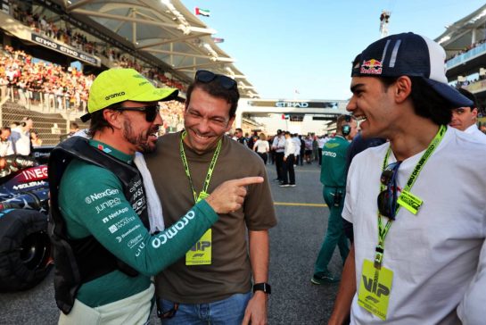 Fernando Alonso (ESP) Aston Martin F1 Team (Left) with Sebastian Montoya (COL) (Right) on the grid.
08.12.2024. Formula 1 World Championship, Rd 24, Abu Dhabi Grand Prix, Yas Marina Circuit, Abu Dhabi, Race Day.
- www.xpbimages.com, EMail: requests@xpbimages.com © Copyright: Moy / XPB Images