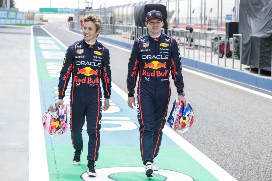 BAHRAIN, BAHRAIN - FEBRUARY 25: Max Verstappen of the Netherlands and Oracle Red Bull Racing and Liam Lawson of New Zealand and Oracle Red Bull Racing talk as they walk in the Pitlane during the Oracle Red Bull Racing Filming Day at Bahrain International Circuit on February 25, 2025 in Bahrain, Bahrain. (Photo by Mark Thompson/Getty Images) // Getty Images // SI202502250372 // Usage for editorial use only //