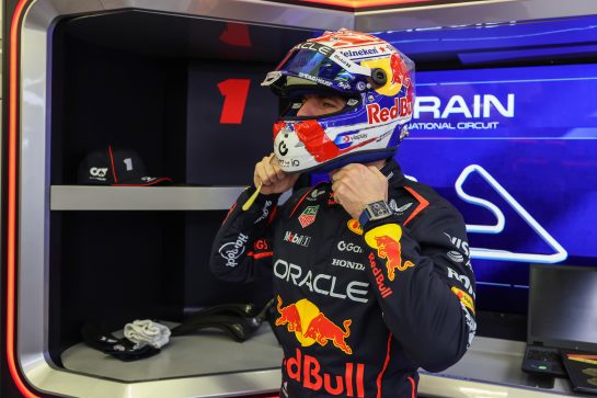 BAHRAIN, BAHRAIN - FEBRUARY 25: Max Verstappen of the Netherlands and Oracle Red Bull Racing fastens his helmet during the Oracle Red Bull Racing Filming Day at Bahrain International Circuit on February 25, 2025 in Bahrain, Bahrain. (Photo by Mark Thompson/Getty Images) // Getty Images // SI202502250383 // Usage for editorial use only //