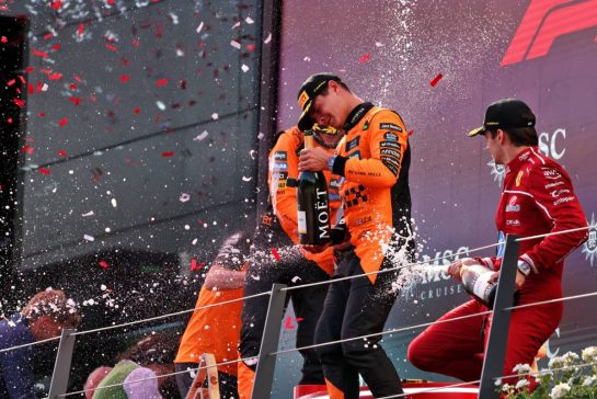 Race winner Lando Norris (GBR) McLaren celebrates on the podium with third placed Charles Leclerc (MON) Ferrari.
29.06.2025. Formula 1 World Championship, Rd 11, Austrian Grand Prix, Spielberg, Austria, Race Day.
- www.xpbimages.com, EMail: requests@xpbimages.com © Copyright: Moy / XPB Images