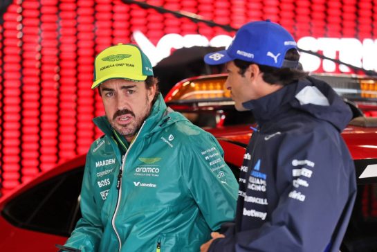 (L to R): Fernando Alonso (ESP) Aston Martin F1 Team with Carlos Sainz (ESP) Atlassian Williams Racing on the drivers' parade.
06.07.2025. Formula 1 World Championship, Rd 12, British Grand Prix, Silverstone, England, Race Day.
- www.xpbimages.com, EMail: requests@xpbimages.com © Copyright: Davenport / XPB Images
