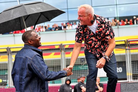 Norman Cook (GBR) Fatboy Slim DJ (Right) on the grid with Idris Elba (GBR) Actor.
06.07.2025. Formula 1 World Championship, Rd 12, British Grand Prix, Silverstone, England, Race Day.
- www.xpbimages.com, EMail: requests@xpbimages.com © Copyright: Batchelor / XPB Images