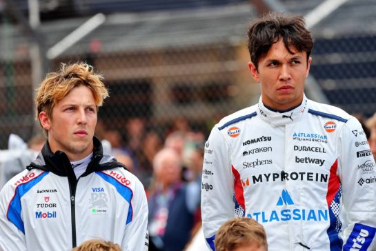 (L to R): Liam Lawson (NZL) Racing Bulls and Alexander Albon (THA) Atlassian Williams Racing as the grid observes the national anthem.
06.07.2025. Formula 1 World Championship, Rd 12, British Grand Prix, Silverstone, England, Race Day.
- www.xpbimages.com, EMail: requests@xpbimages.com © Copyright: Batchelor / XPB Images