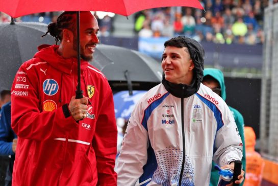 (L to R): Lewis Hamilton (GBR) Ferrari and Isack Hadjar (FRA) Racing Bulls on the drivers' parade.
06.07.2025. Formula 1 World Championship, Rd 12, British Grand Prix, Silverstone, England, Race Day.
- www.xpbimages.com, EMail: requests@xpbimages.com © Copyright: Moy / XPB Images